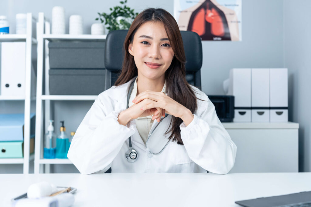 portrait of beautiful physician doctor sit on tabl 2023 11 27 04 57 40 utc