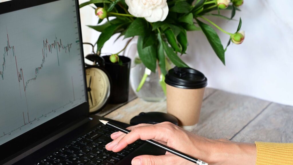 the girl is working at the computer stock trading 2023 11 27 05 32 27 utc edited