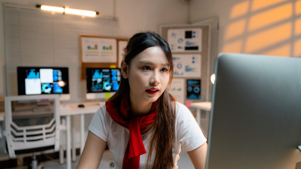 【公式】IMAT出願サポート|総額5万円から始めるイタリア医学部留学 5 young asian businesswoman analyzing data on comput 2025 03 18 21 16 26 utc